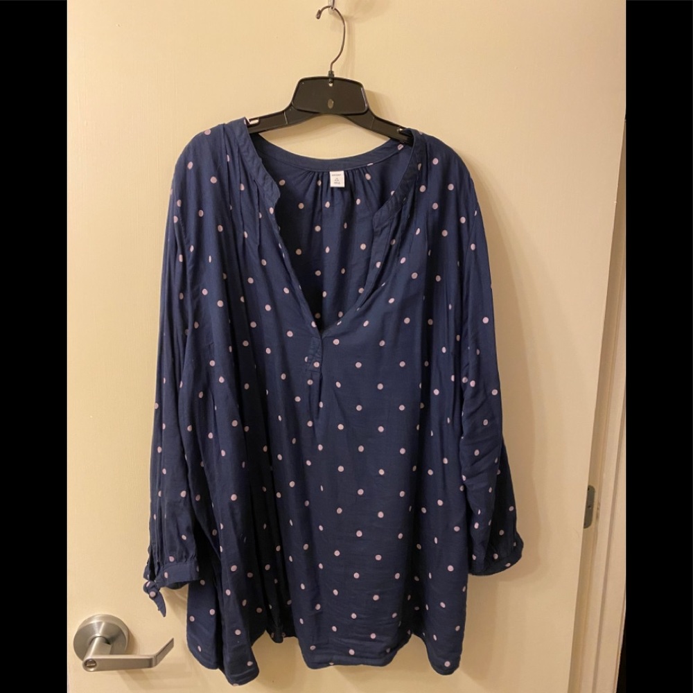 Blue blouse with lavender polka dots.